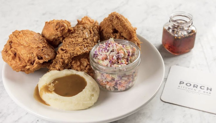 Porch Kitchen and Bar signature dishes Southern Fried ChickenBourbon Butter CakeLump Crab Hushpuppies